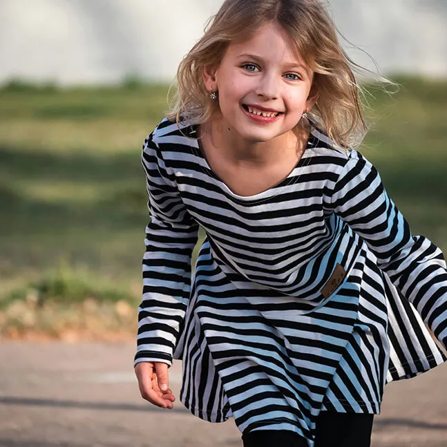 After School Care Program Girl smiling while playing