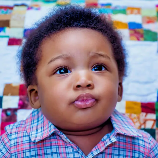 Infant and Toddler Program Baby lying on blanket